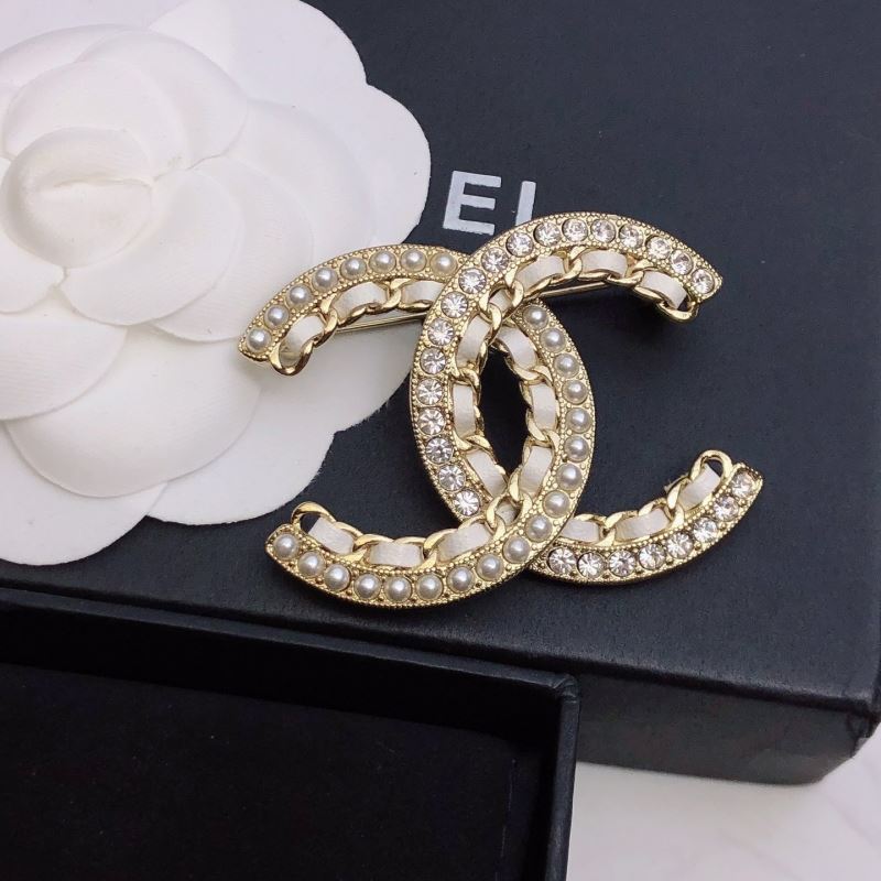 Ch*el brooches